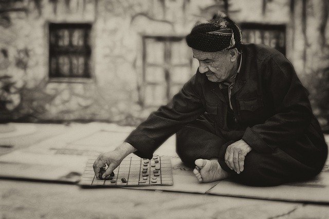 old man and board game