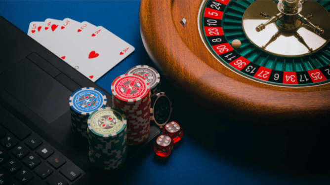 playing cards on brown wooden table photo